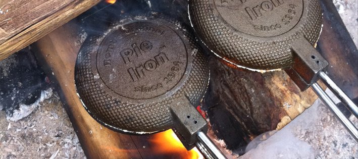 pie iron desserts cooking over a campfire