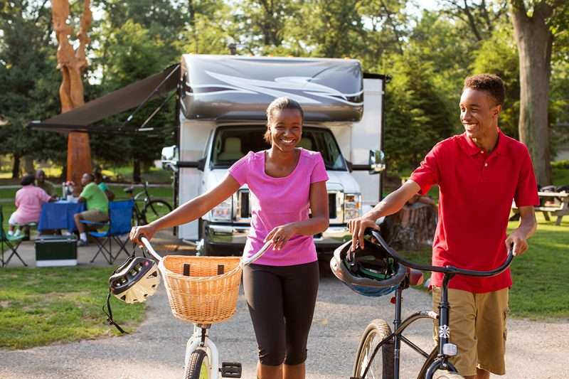 teens biking at an RV campground