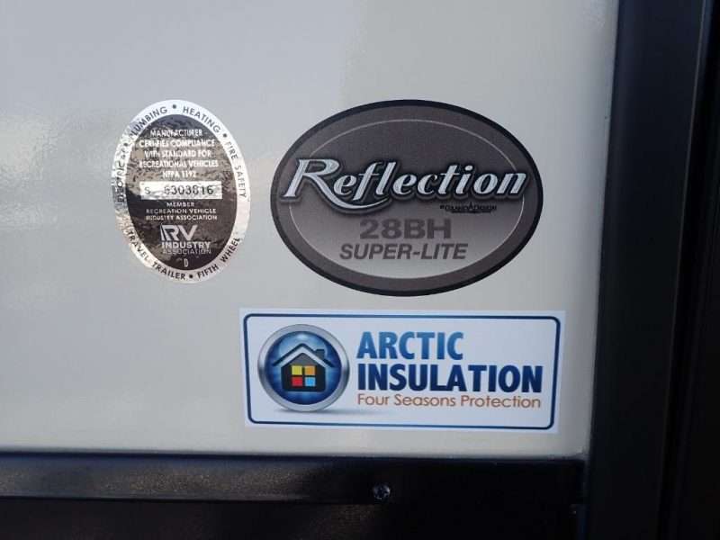 A common RV myth about Arctic Insulation packages is busted; here is an RV with an Arctic Insulation logo