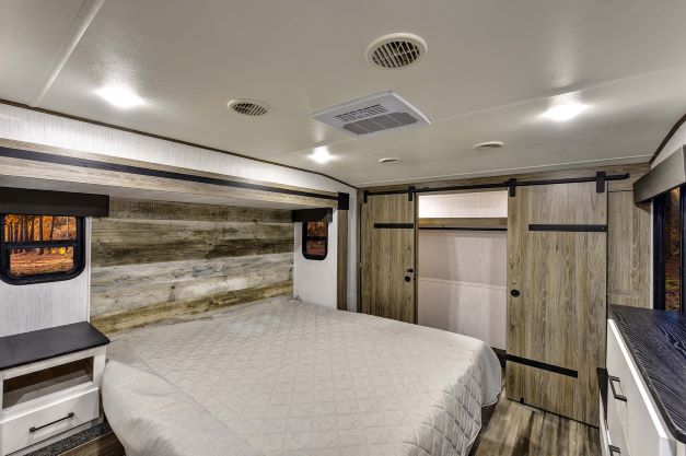 Master bedroom inside the new Heartland Milestone fifth wheel RV 