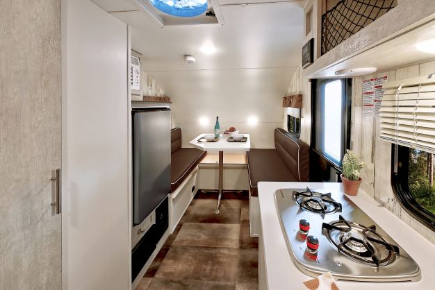 The new Travel Lite Rove Lite RV makes good use of space with a convertible dinette
